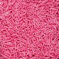 Eight shirts arranged on table in black, olive, grey, blue, white, red, mustard, and green.