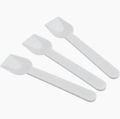 Eight shirts arranged on table in black, olive, grey, blue, white, red, mustard, and green.